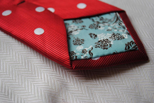 red tie with white polka dots
